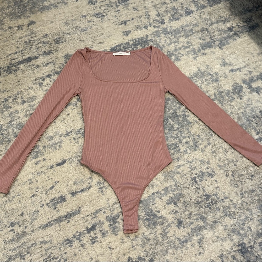 Lush bodysuit size small. Worn once.